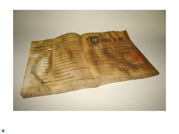 This was an amusing project. Although it looks like a medieval vellum manuscript page, it is actually a piece of architectural drafting film, inkjet printed and trimmed. I even cut out the holes in the parchment image.