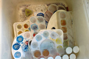 Cleaning up in my studio: way too many dirty palettes!